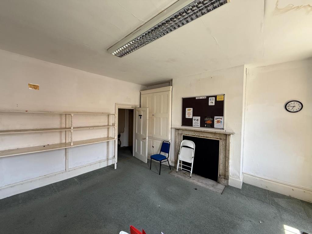 Lot: 67 - FREEHOLD THREE STOREY TOWN CENTRE OFFICE BUILDING - A View of one of the Former Music Practice Rooms